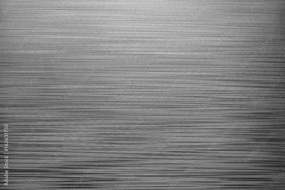 Irregular horizontal lines background. Grey plastic texture closeup Irregular horizontal lines background. Grey plastic texture closeup