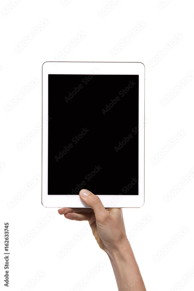 Hand holding a tablet isolated on white