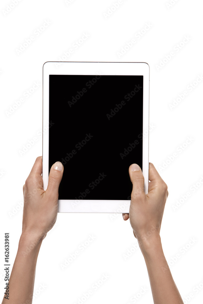 Hands holding a tablet isolated on white Hands holding a tablet isolated on white
