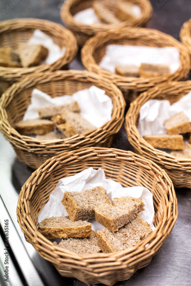 Fresh sliced wholewheat bread in baskets
