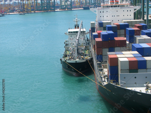 Bunkering tanker container ship in port