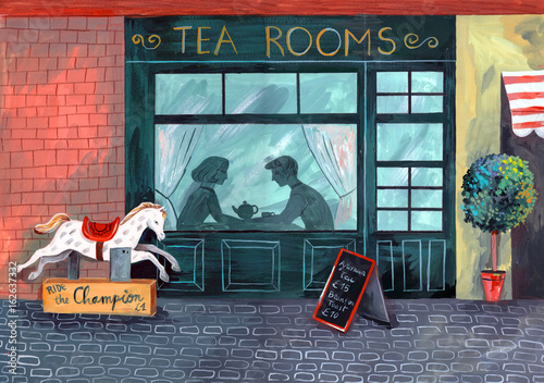 Couple drinking tea in a cafe 