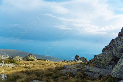 Beautiful landscape with stones and magnificent cloudy sky. Vitosha mountain, Sofia, Bulgaria.