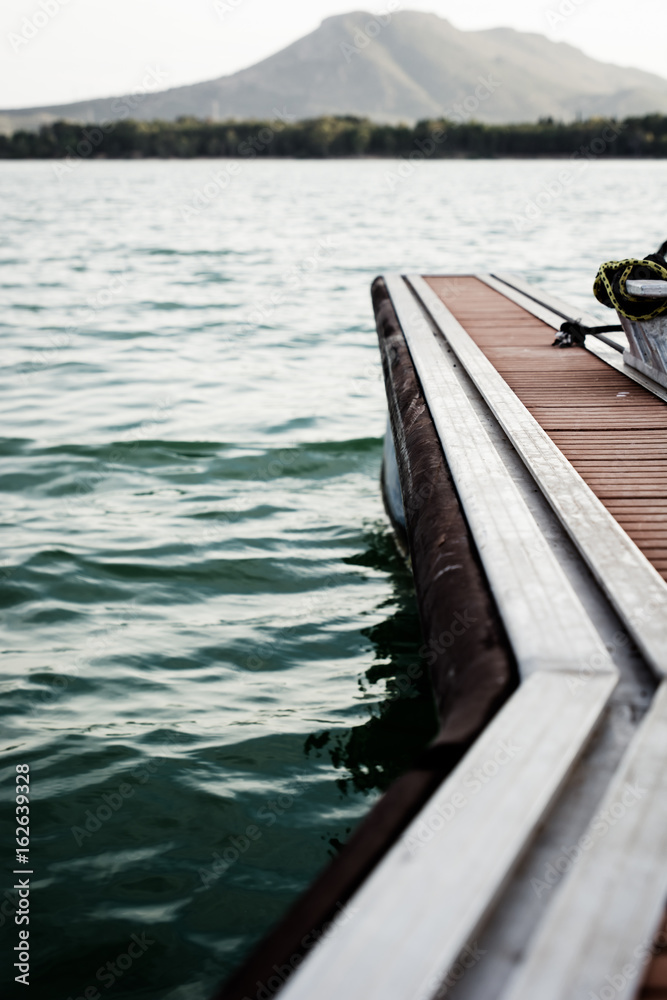 Detail of an empty jetty in a lake Detail of an empty jetty in a lake