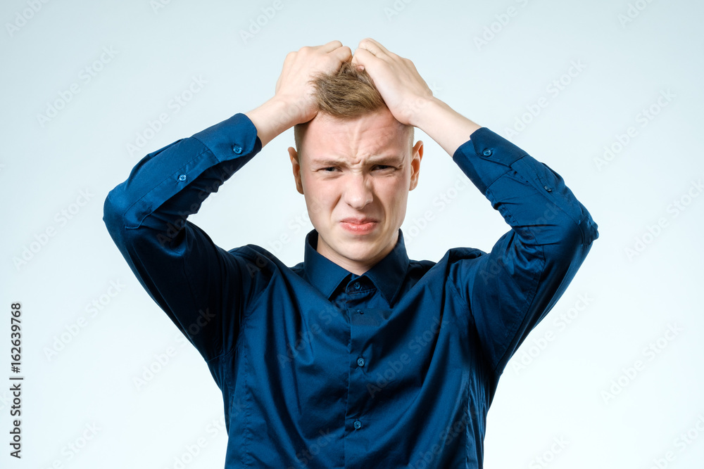 Portrait of stressed young man isolated Portrait of stressed young man isolated