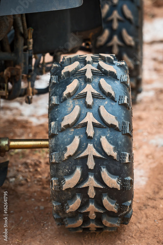 Fototapeta Naklejka Na Ścianę i Meble -  wheel tire off ATV