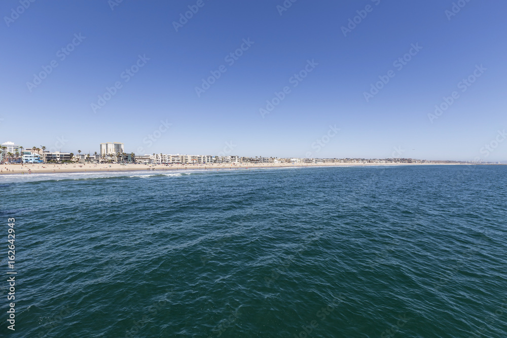 Blue summer sky and pacific ocean water at Venice Beach in Los Angeles, California.  