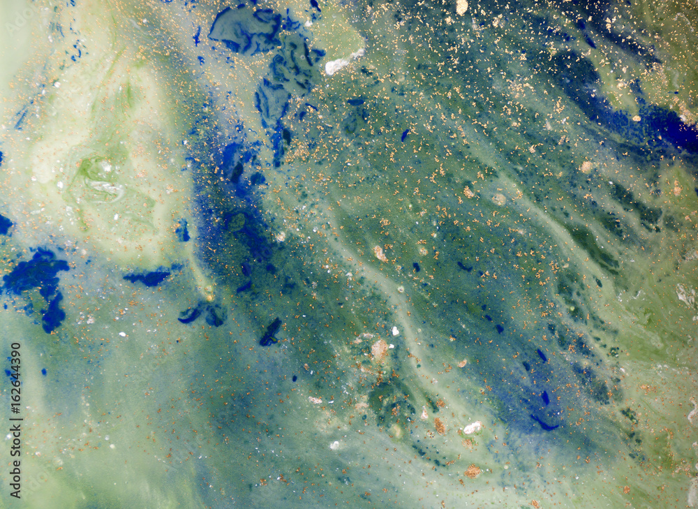 Marbled blue, green and golden abstract background. Liquid marble pattern. Marbled blue, green and golden abstract background. Liquid marble pattern.