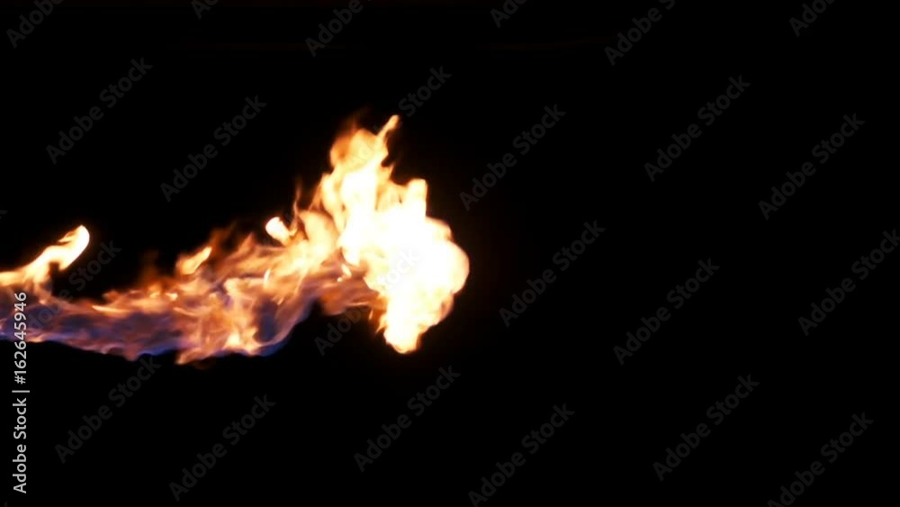 Hot lick of continuous flame shot in studio in slow motion Hot lick of continuous flame shot in studio in slow motion