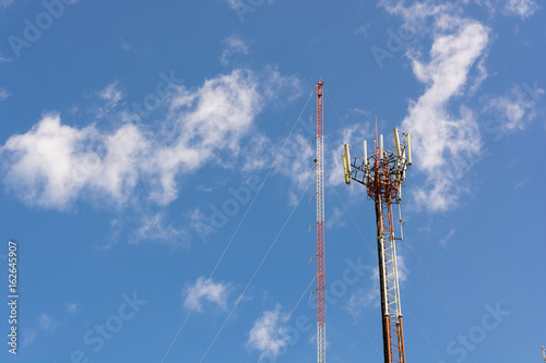 Telecommunication towers with blue sky