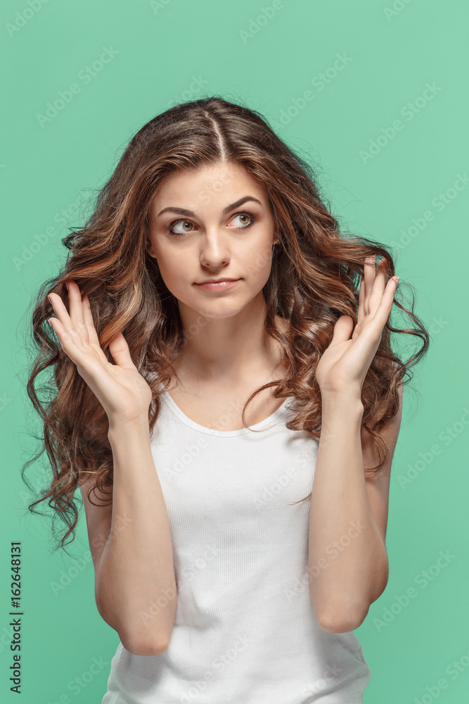The young woman's portrait with thoughtful emotions The young woman's portrait with thoughtful emotions