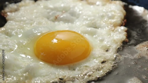 frying egg sunny side up