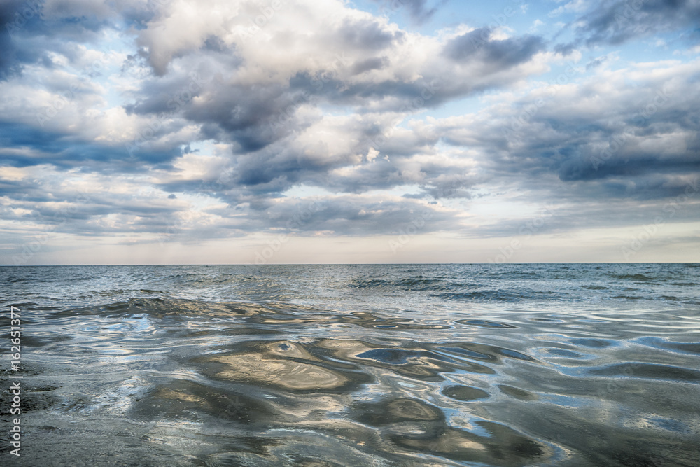 Fototapeta premium Clouds and sea