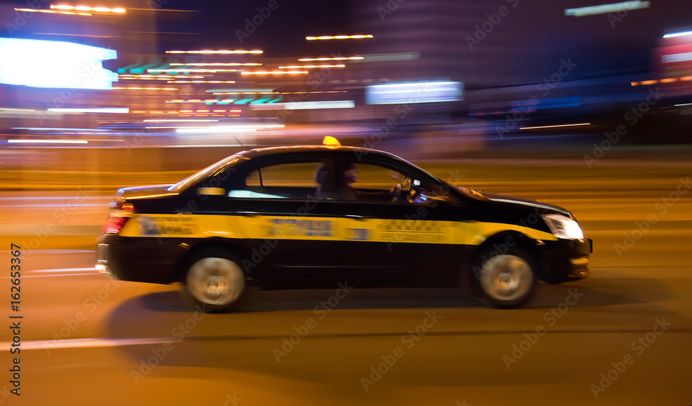 movement car taxi with blur effect /  movement car at night with blur effect  