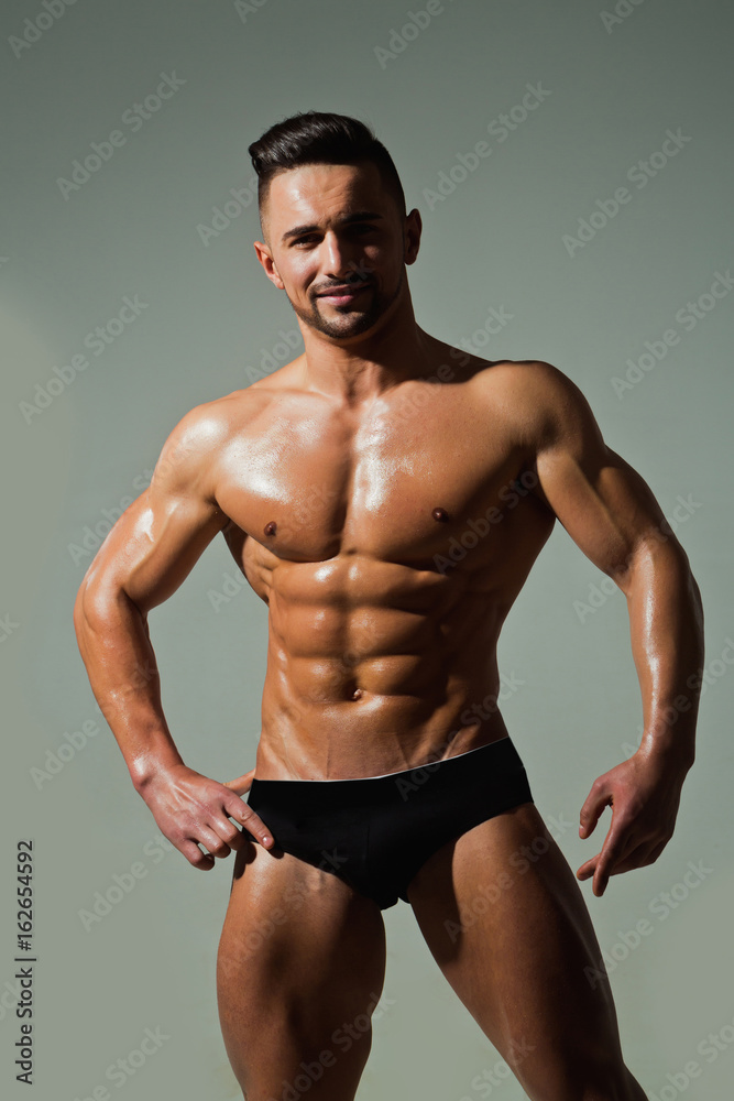 guy smiling with muscular body in underwear pants guy smiling with muscular body in underwear pants