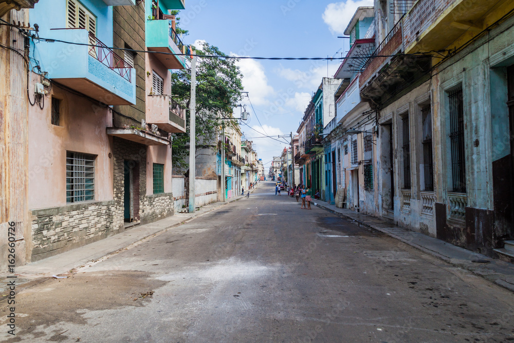 HAVANA, CUBA - FEB 20, 2016: Life on a street in Havana Centro neighborhood.