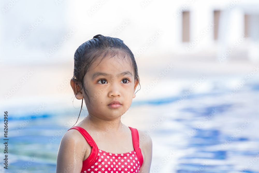 baby happy in the pool