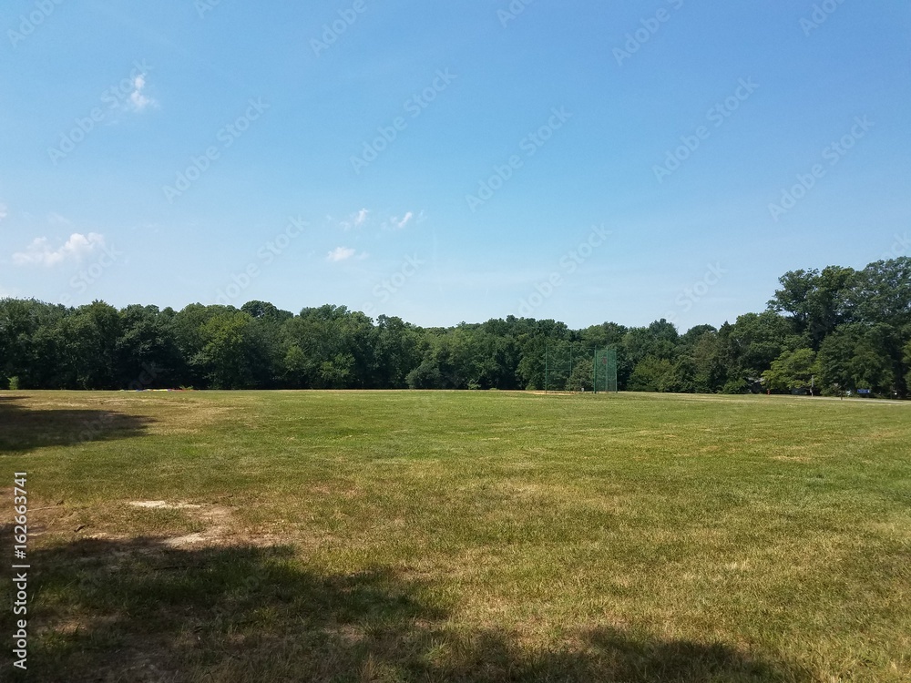 grass field with baseball diamond