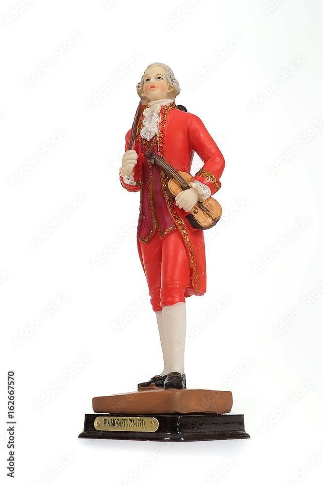 Souvenir figure of the old Austrian musician with a violin. The inscription is the name of the great musician 