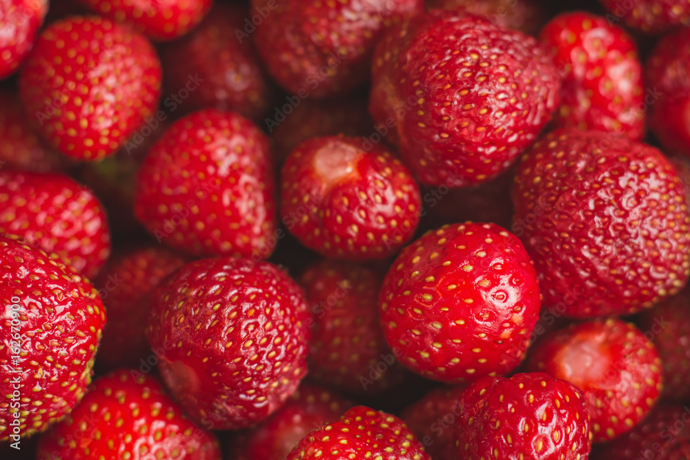background from freshly harvested strawberries, full frame. background from freshly harvested strawberries, full frame.