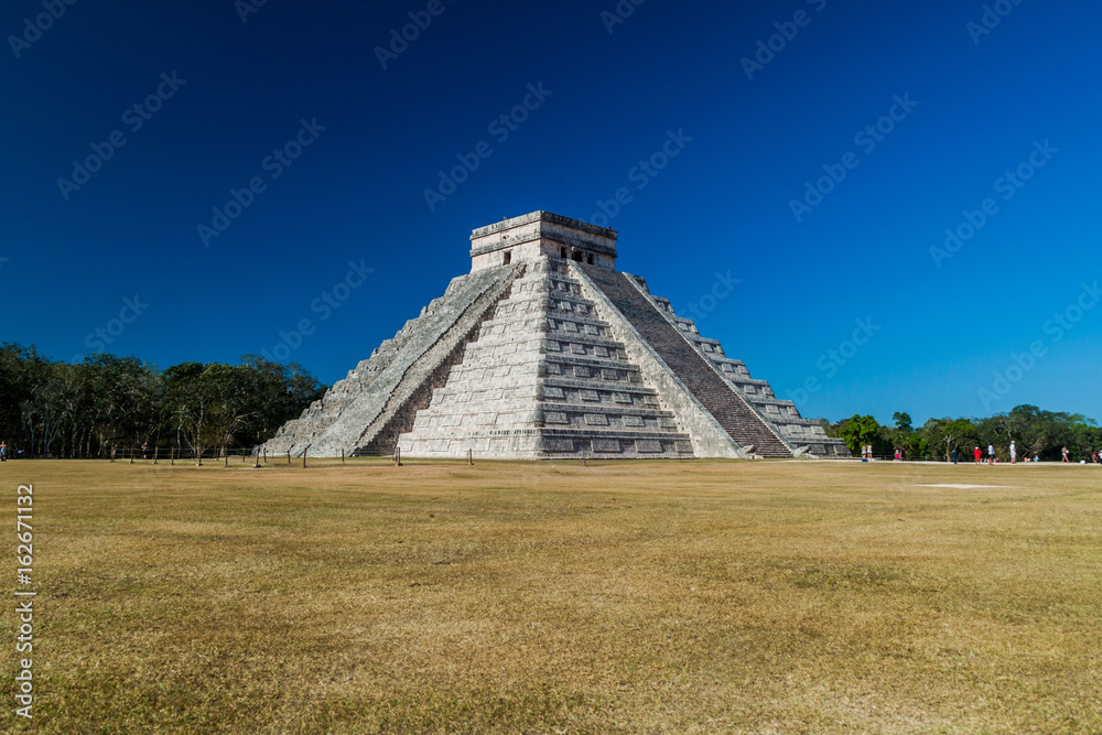 CHICHEN ITZA, MEXICO - FEB 26, 2016: Pyramid Kukulkan in the Mayan archeological site Chichen Itza, Mexico
