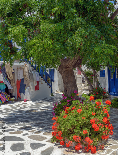 Colorful pedestrian street in Mykonos island, Greece.