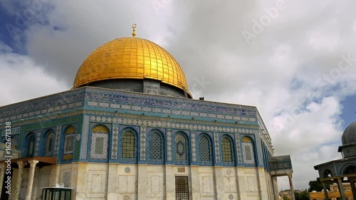 Clouds over Dome of the Rock in Jerusalem over the Temple Mount. Golden Dome is the most known mosque and landmark in Jerusalem and sacred place for all muslims.
