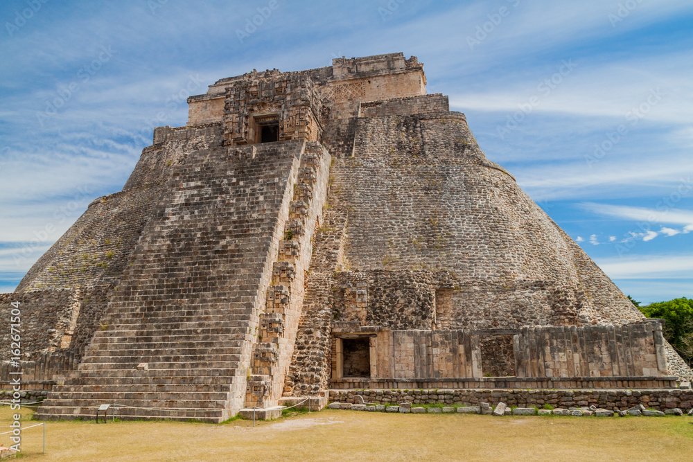 Pyramid of the Magician (Piramide del adivino) at the ruins of the ancient Mayan city Uxmal, Mexico Pyramid of the Magician (Piramide del adivino) at the ruins of the ancient Mayan city Uxmal, Mexico