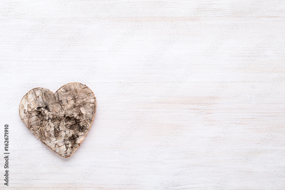 Obraz premium Background with wooden hearts, place for text.