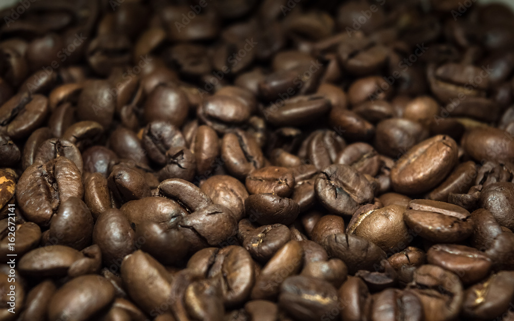 Closeup view of brown coffee beans texture