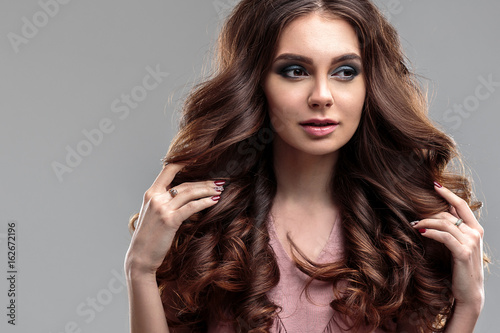 closeup beauty portrait of young woman with natural makeup and hairstyle. spa and care.