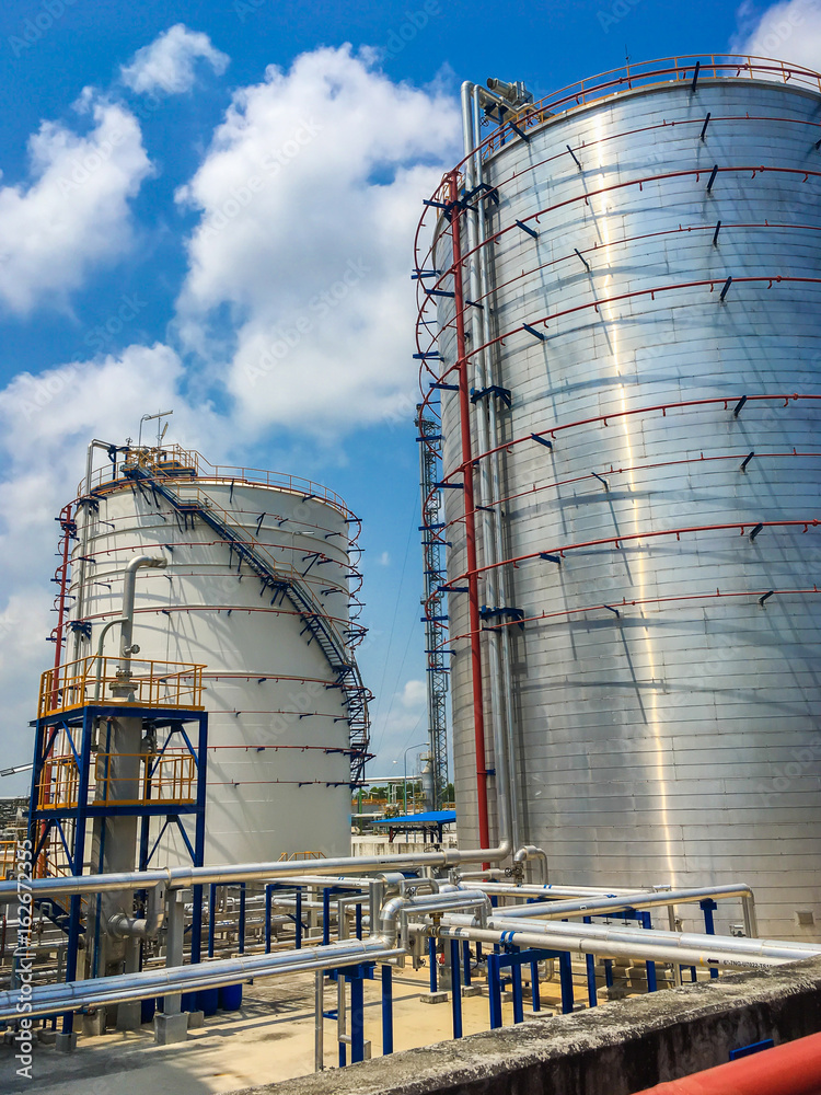 Oil and chemical large tank with blue sky Oil and chemical large tank with blue sky