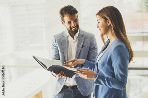 Business partners analyze the business results photo