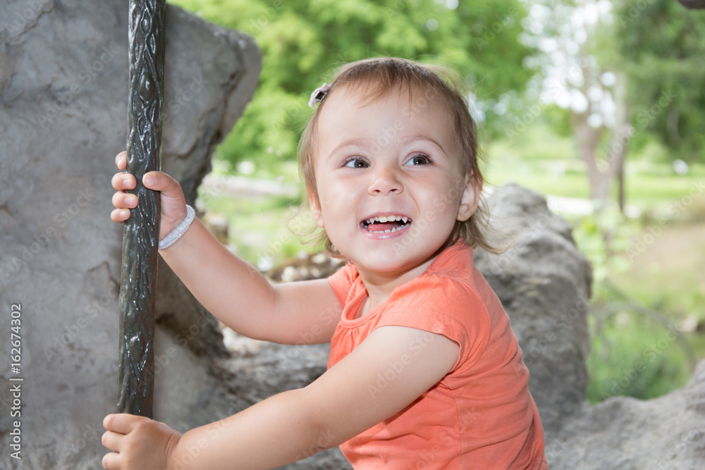 young girl child outdoors in the garden park young girl child outdoors in the garden park