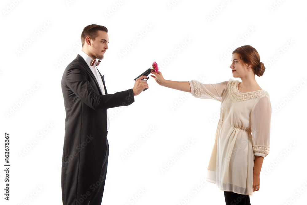 man with gun and women with flower man with gun and women with flower