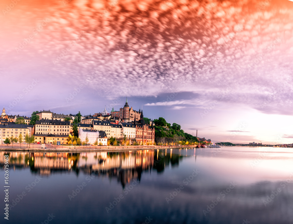 Scenic Stockholm City Old Town Sunset Skyline. Panoramic montage from 12 images