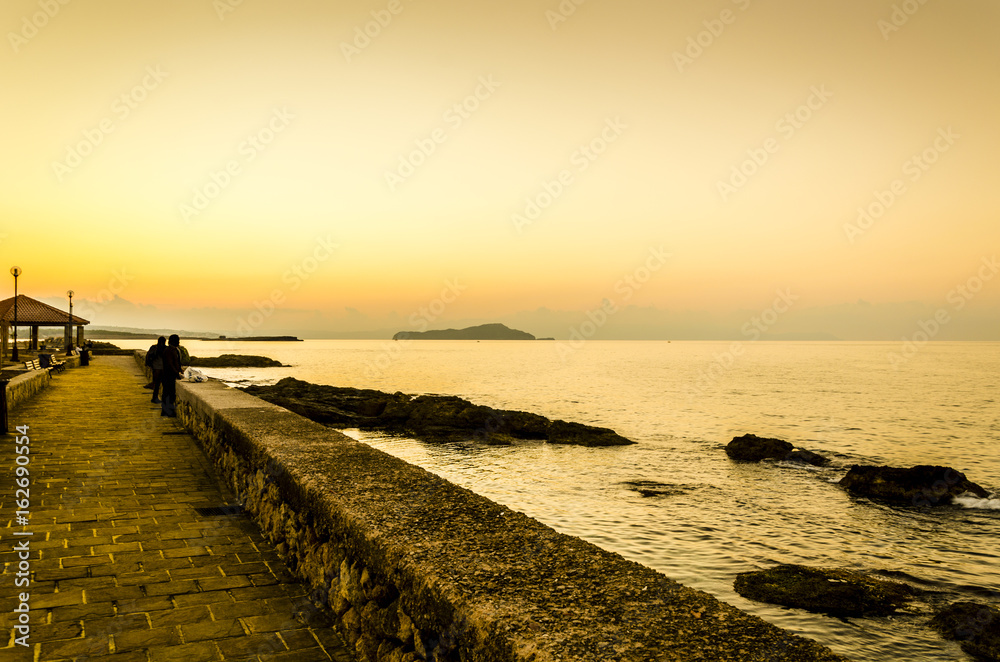 Sunset on the coast of the city of Chania.