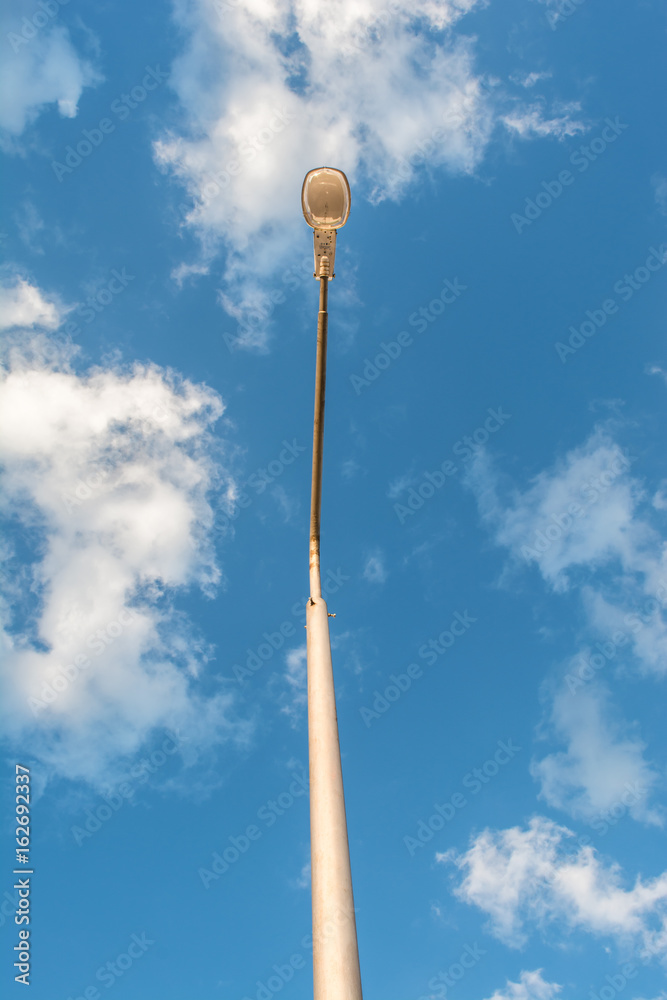 Street lamp on blue sky background Street lamp on blue sky background