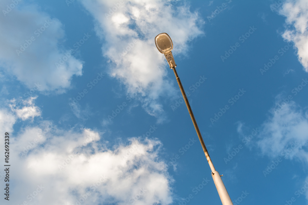 Street lamp on blue sky background Street lamp on blue sky background