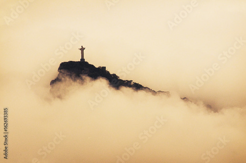Christ the Redeemer statue on the fog