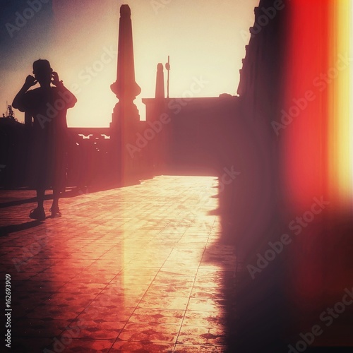 silhouette walking on Martinelli building photo