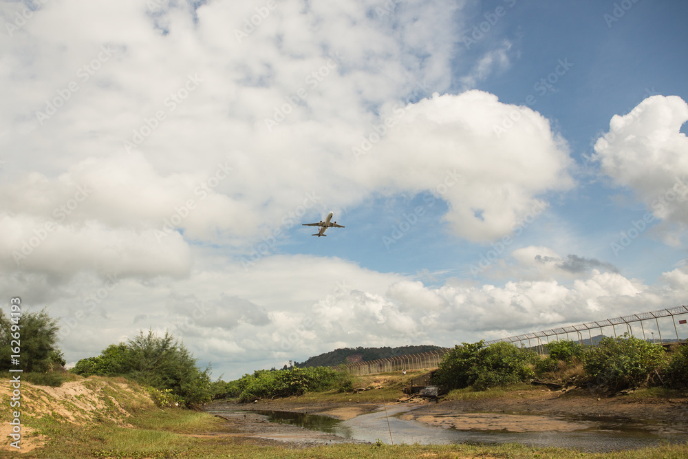 taking off from the airport the passenger plane taking off from the airport the passenger plane