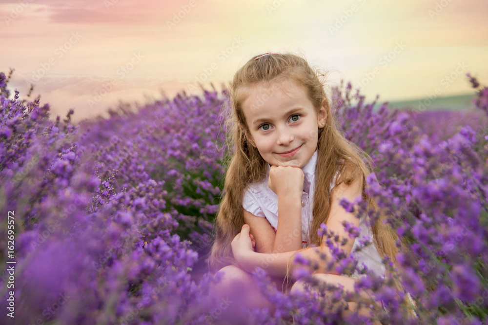 Girl in lavender field at sunset Girl in lavender field at sunset