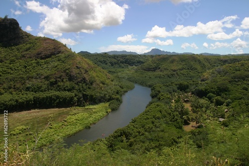 The 20-mile long Wailua River on Kauai  Hawaii is one of the most navigable rivers boasting of lush jungle landscape.