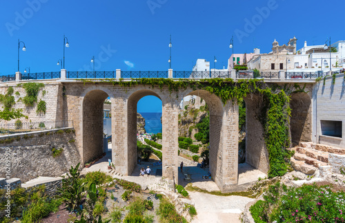Polignano a Mare (Puglia, Italy) - The famous sea town in province of Bari, southern Italy. The village rises on rocky spur over the Adriatic Sea, and is known tourist attraction. photo