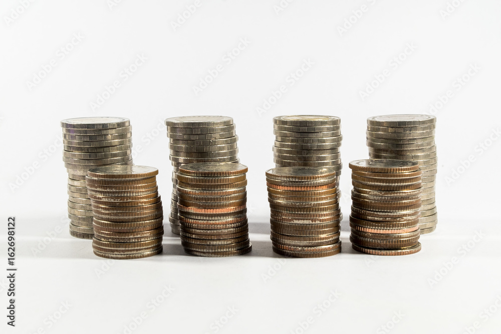coins stacked on white background coins stacked on white background