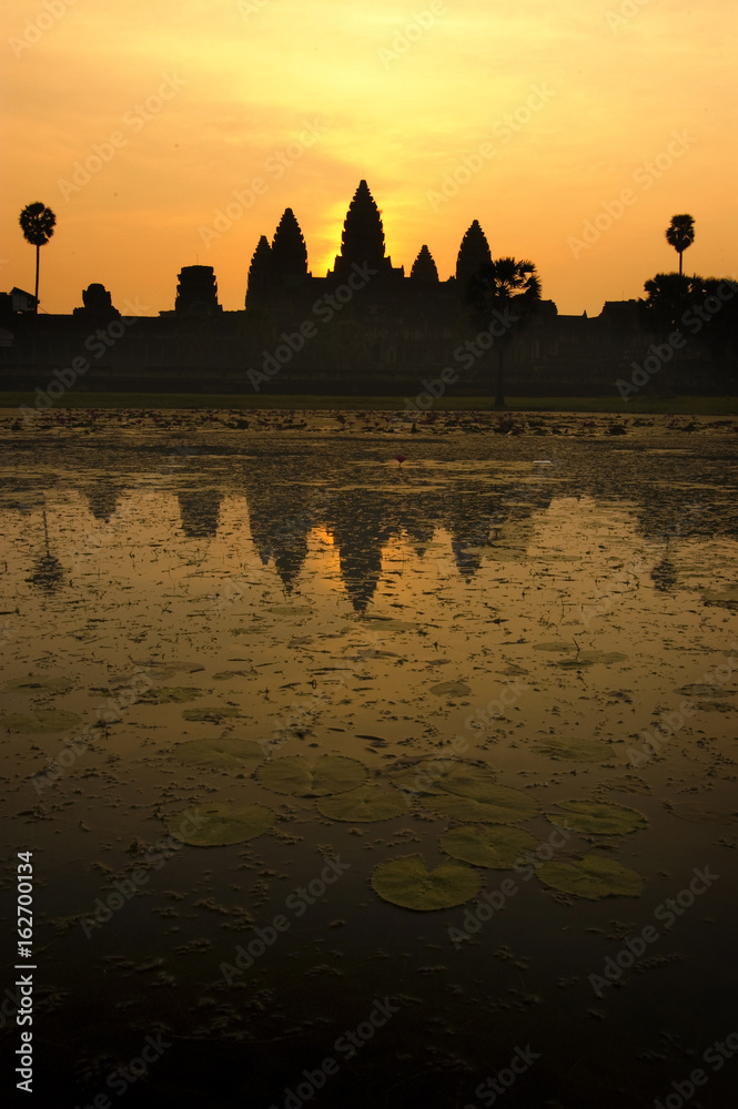 Angkor Wat Temple at Sunrise Beautiful water reflection.