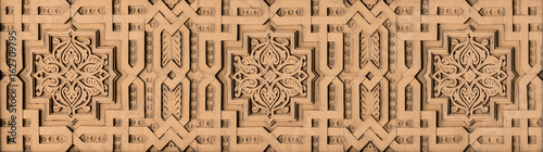 Impressive decorative element, gilded and polychromatic parquet arabesque. Arabic architecture and art.