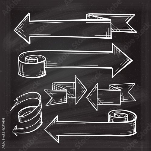  Set of vector doodle arrows on the chalkboard