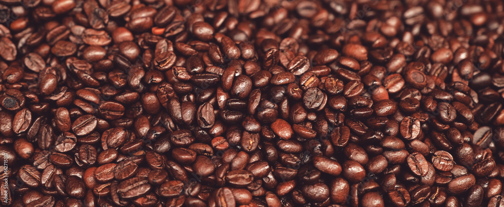 Obraz premium Roasted coffee beans, can be used as a background.